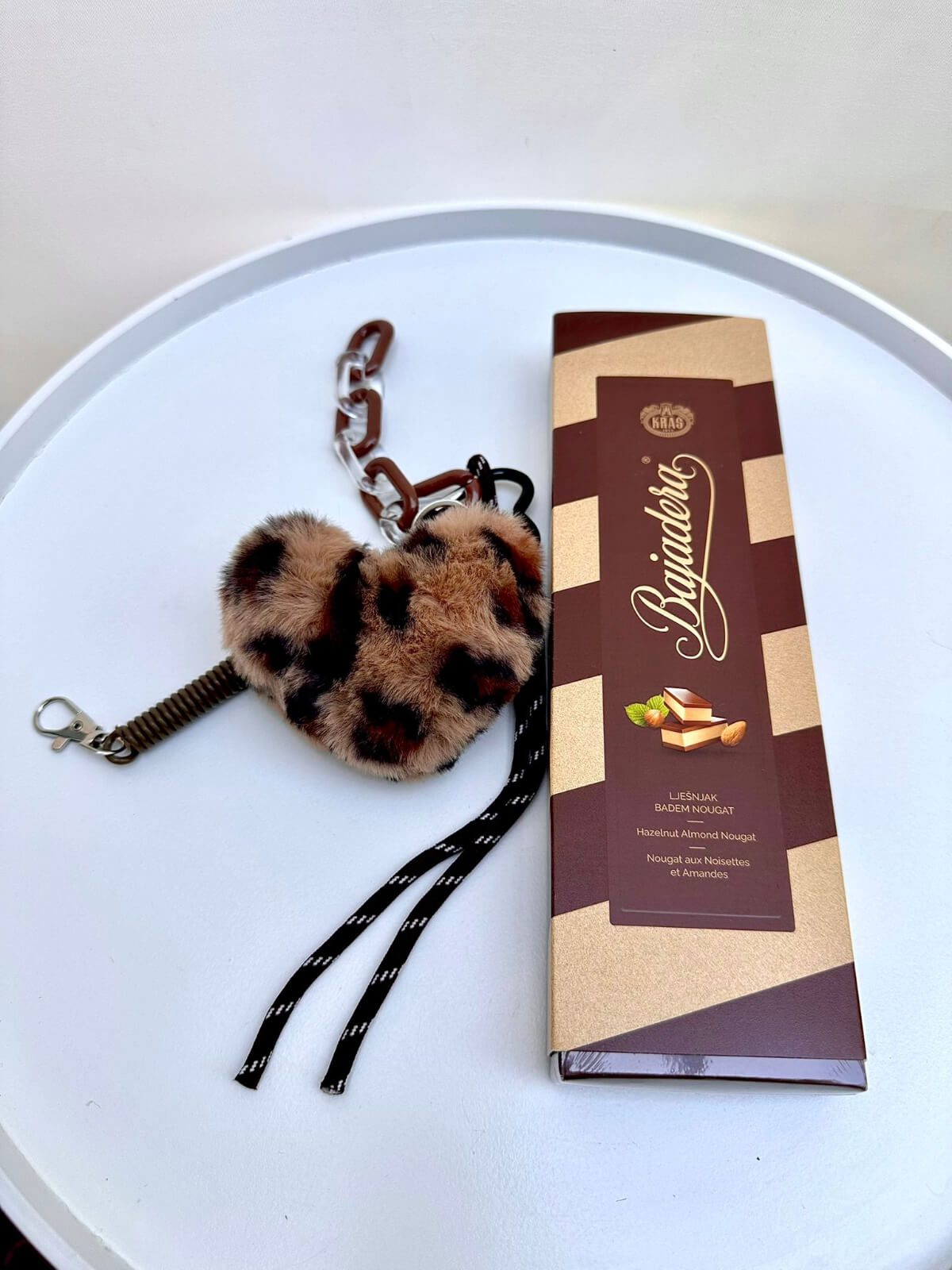 Heart keychain presented in an elegant gift box.