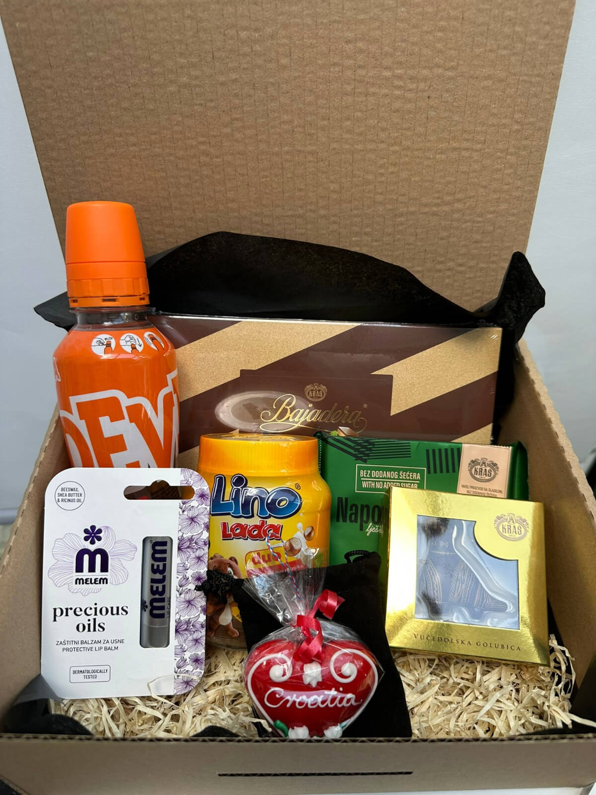 Croatian sweets gift box with traditional treats showcasing local flavors.
