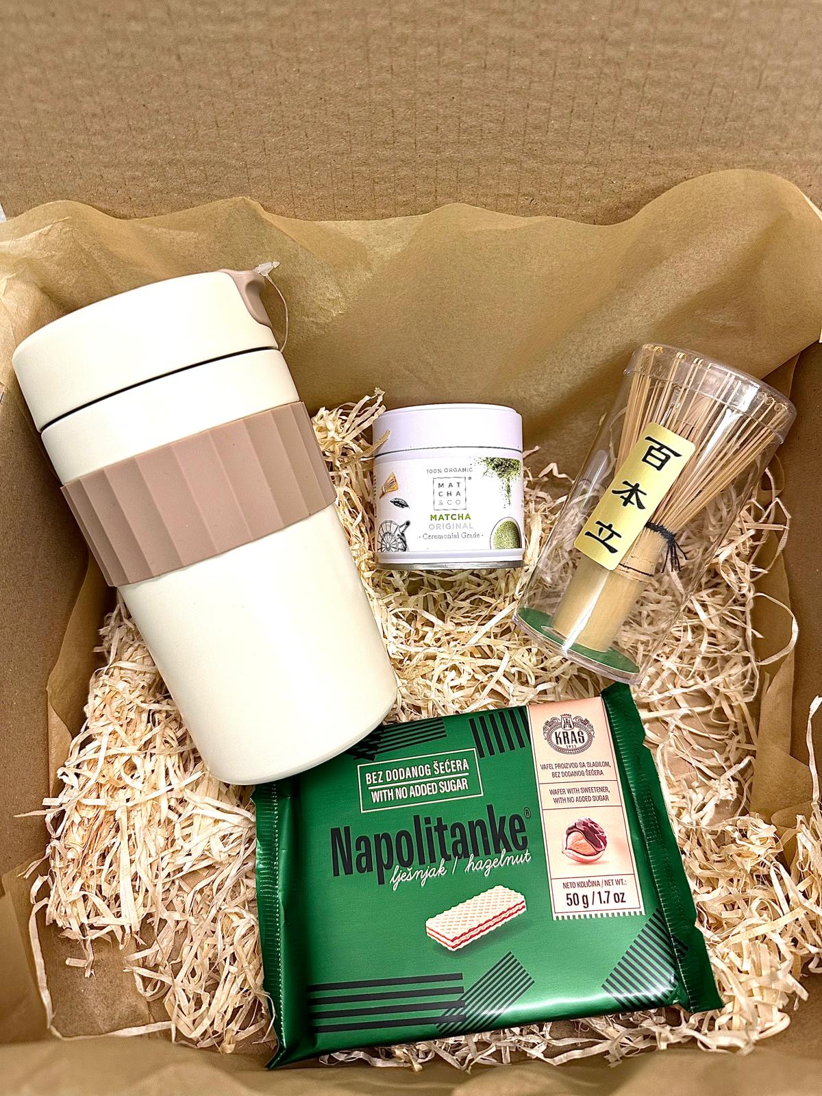 Complete matcha set including bowl, whisk, scoop, and high-quality matcha powder for traditional tea preparation.