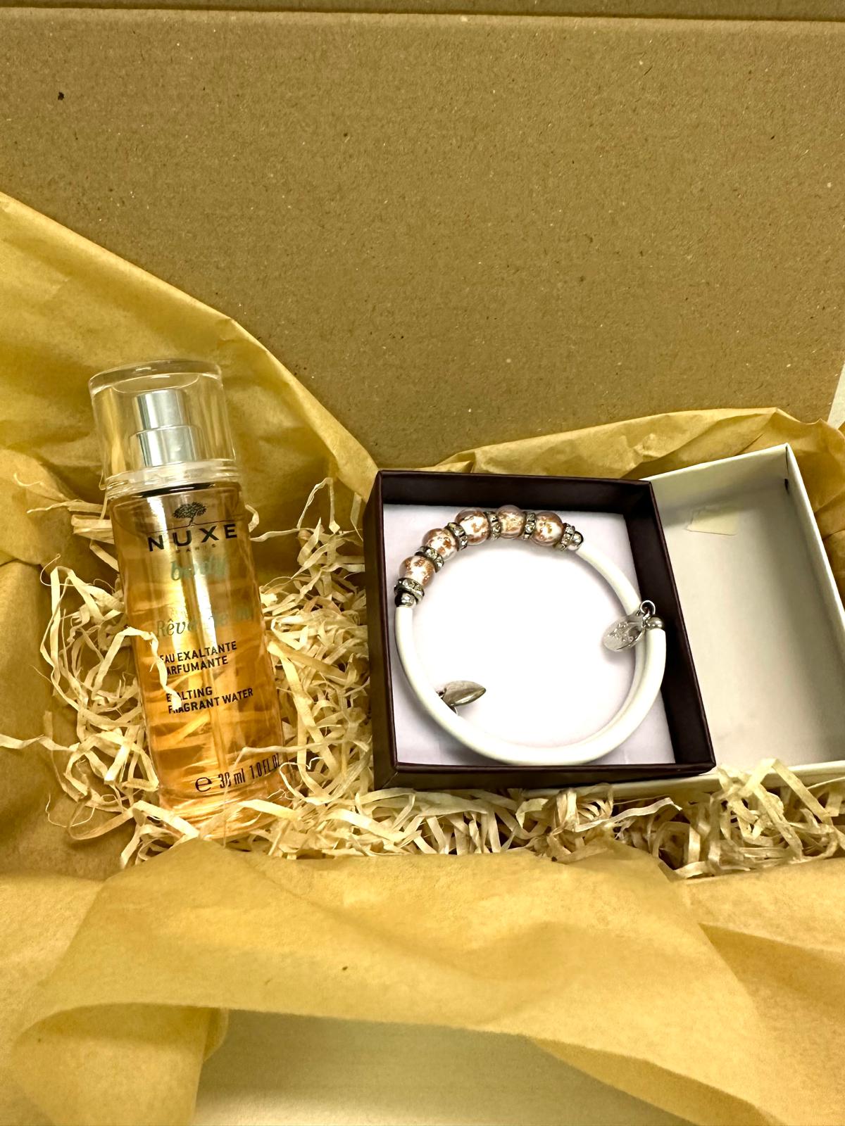 Nuxe Chic gift box with luxurious skincare products and elegant design for daily beauty care.